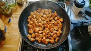 Delicious diced chicken recipes prepared in a kitchen setting.