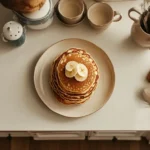 Fluffy buttermilk pancakes made from Martha Stewart's recipe, ready to eat.